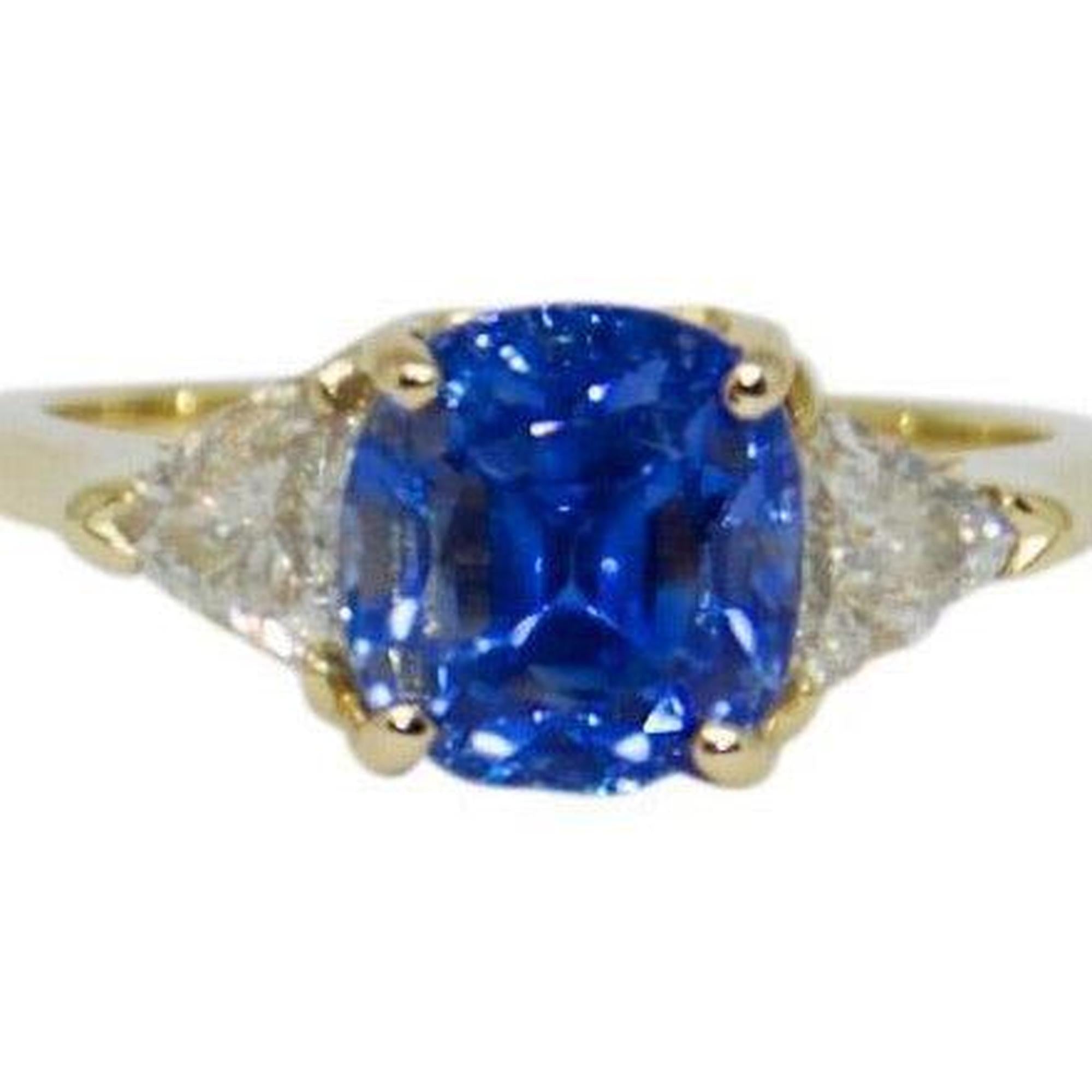 Blue Sapphire and Diamond Three Stone Ring