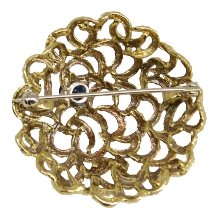 Domed Brooch with Blue Sapphire