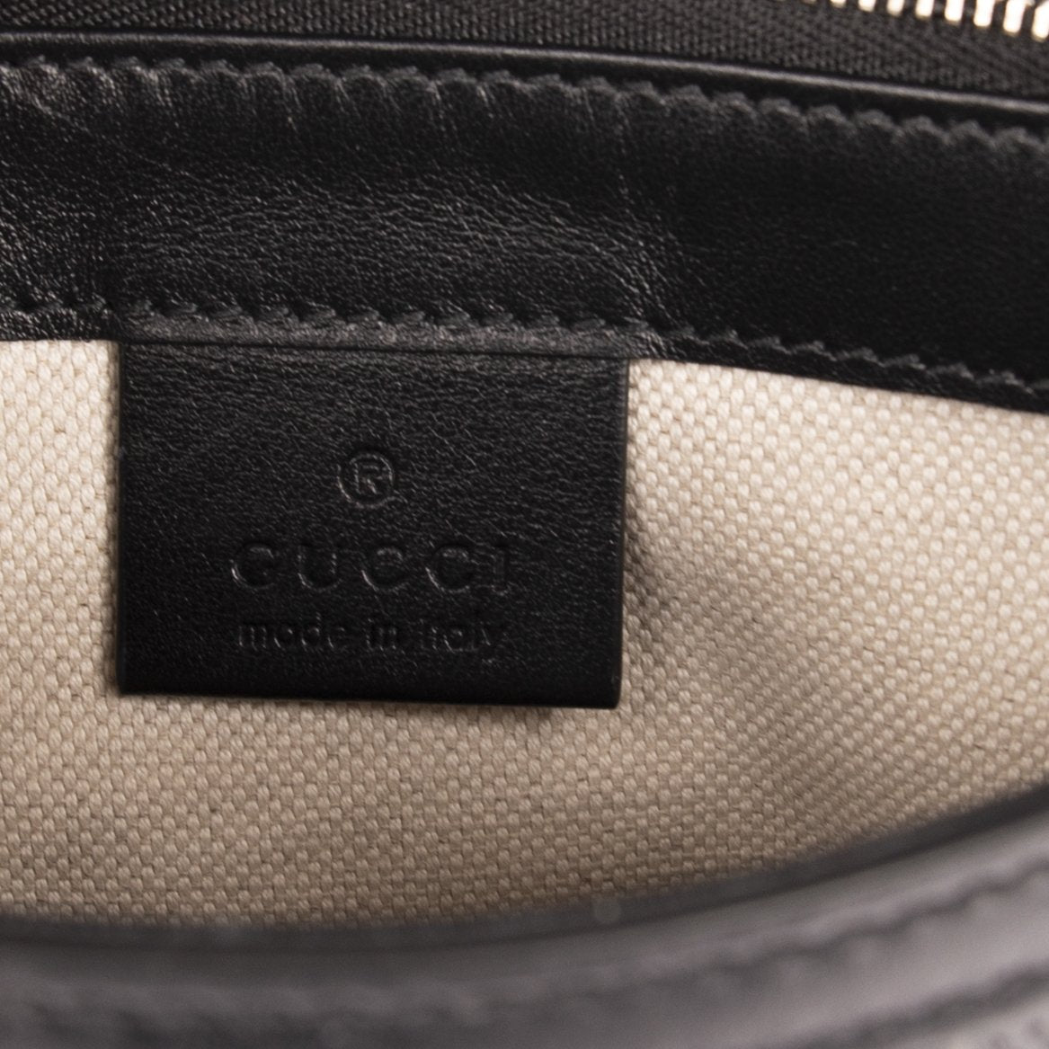 Gucci Black GG Embossed Messenger Bag