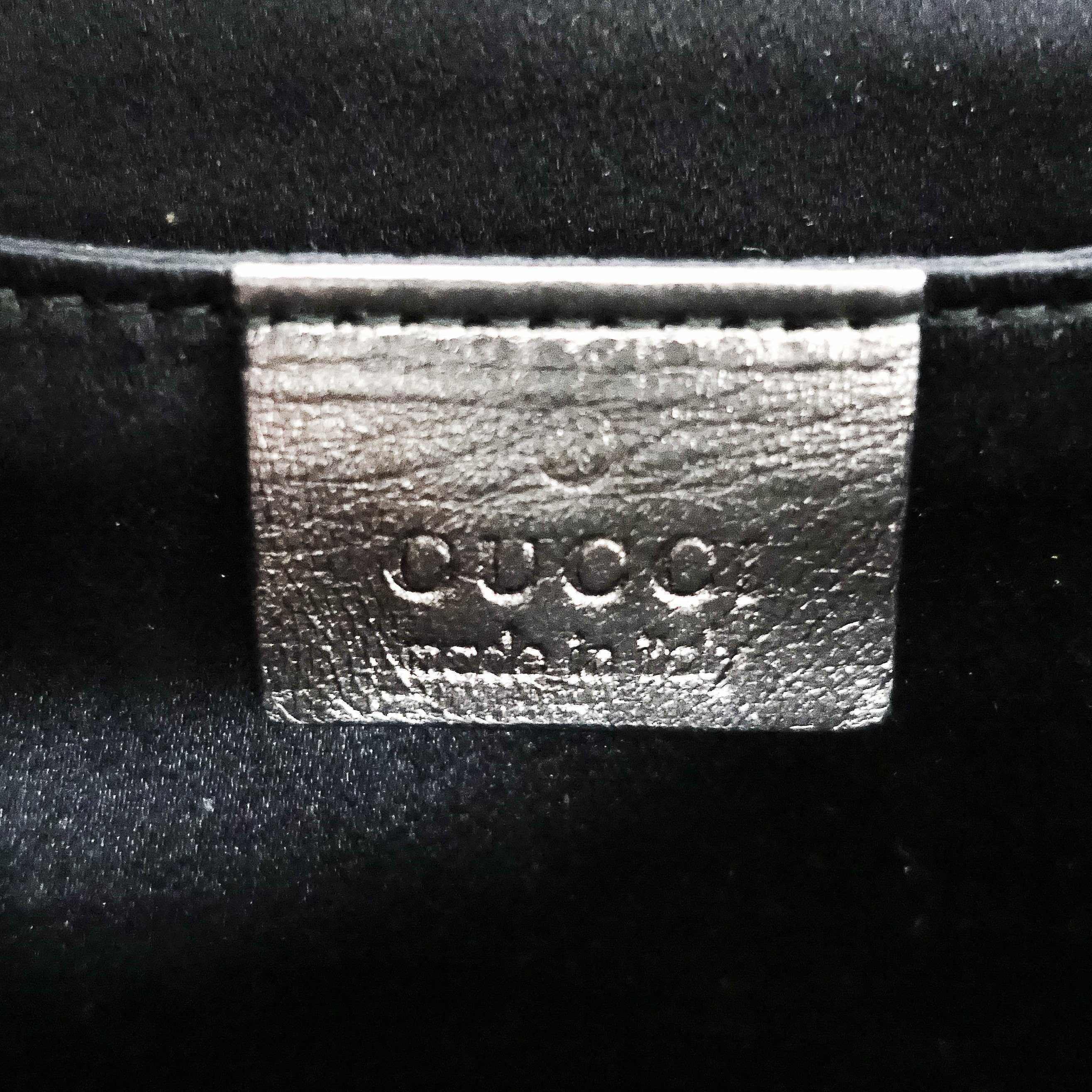 Gucci Grey Metallic Leather Clutch