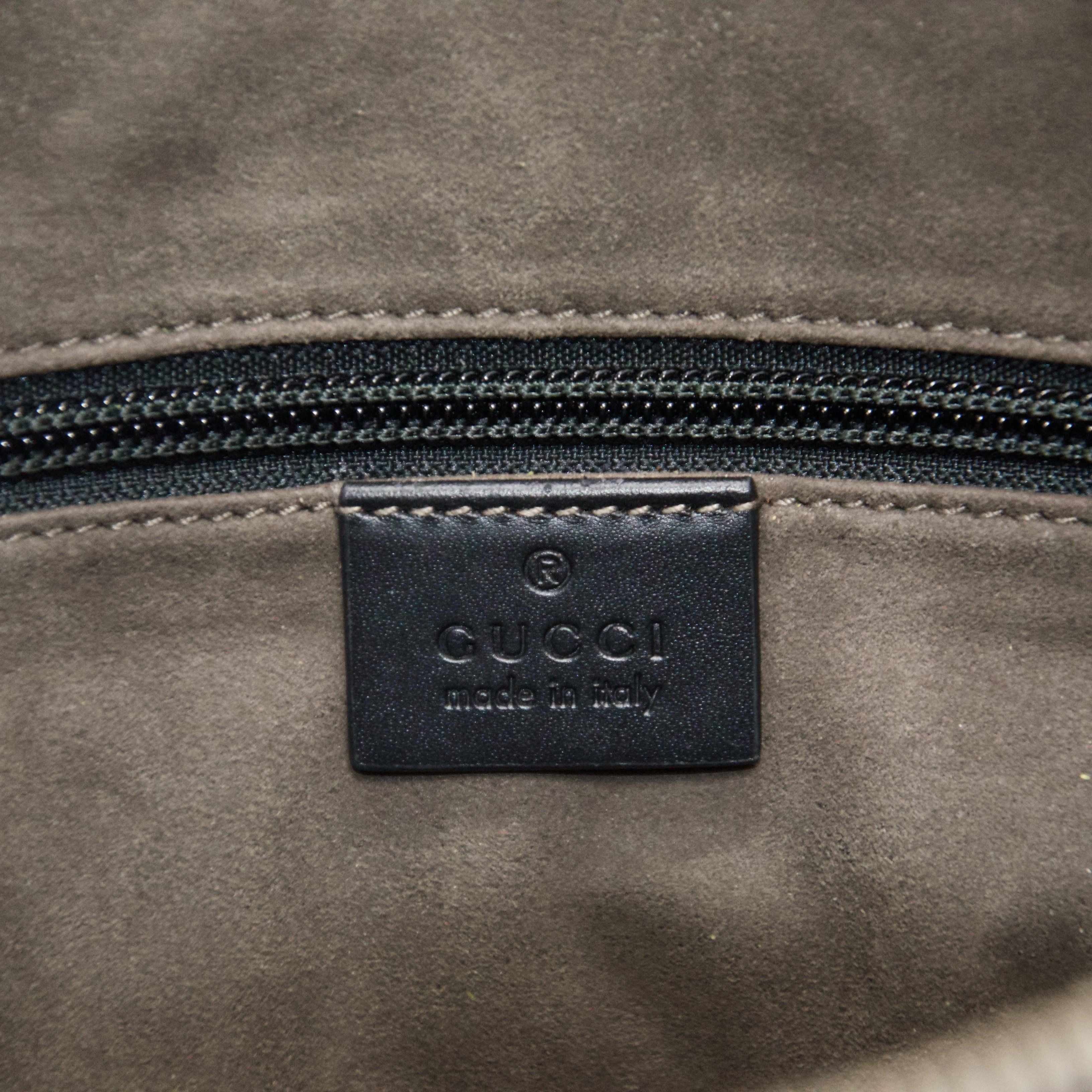 Gucci Signature Leather Messenger Bag