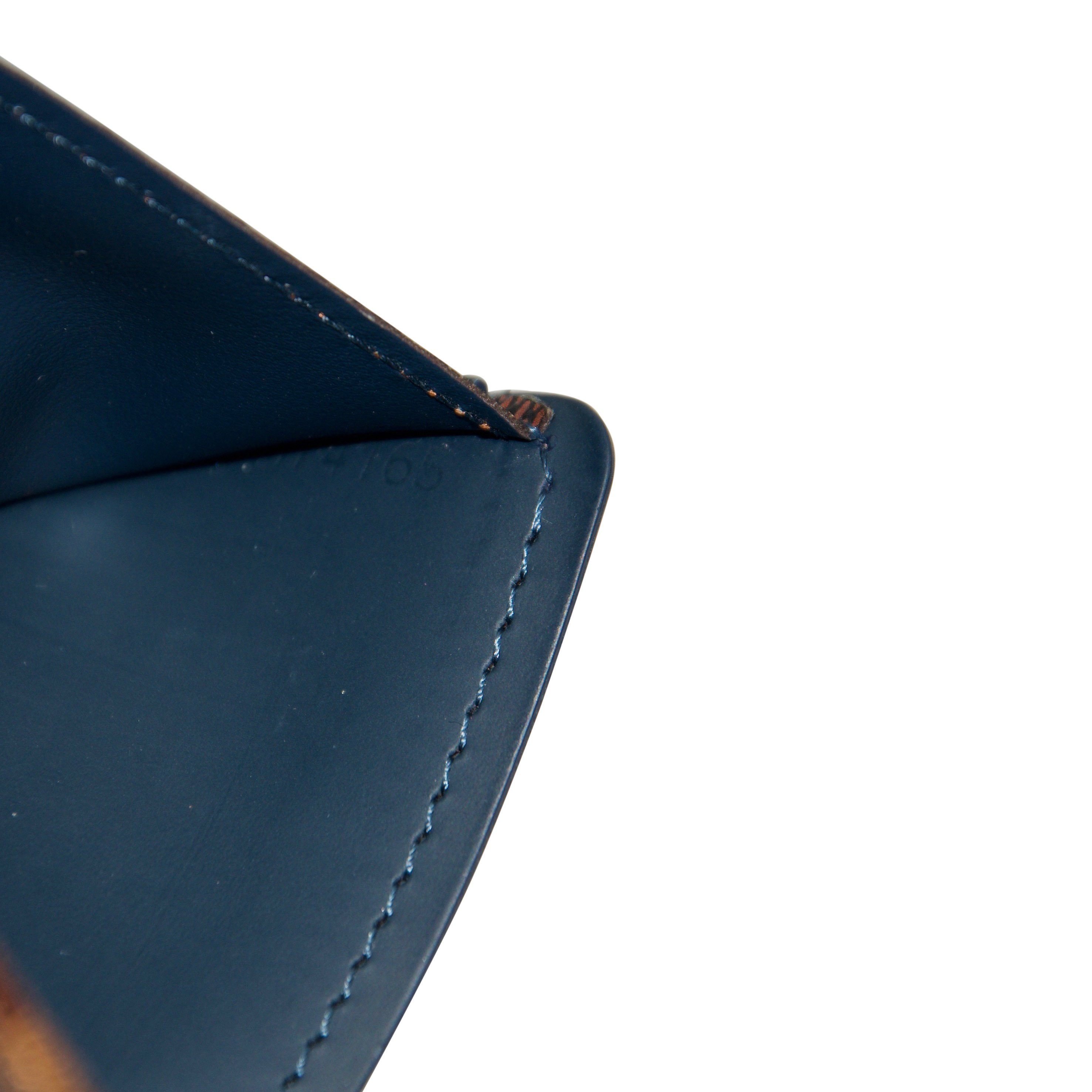 Louis Vuitton Damier Ebene Multiple Wallet with Bleu Calfskin – Oliver  Jewellery