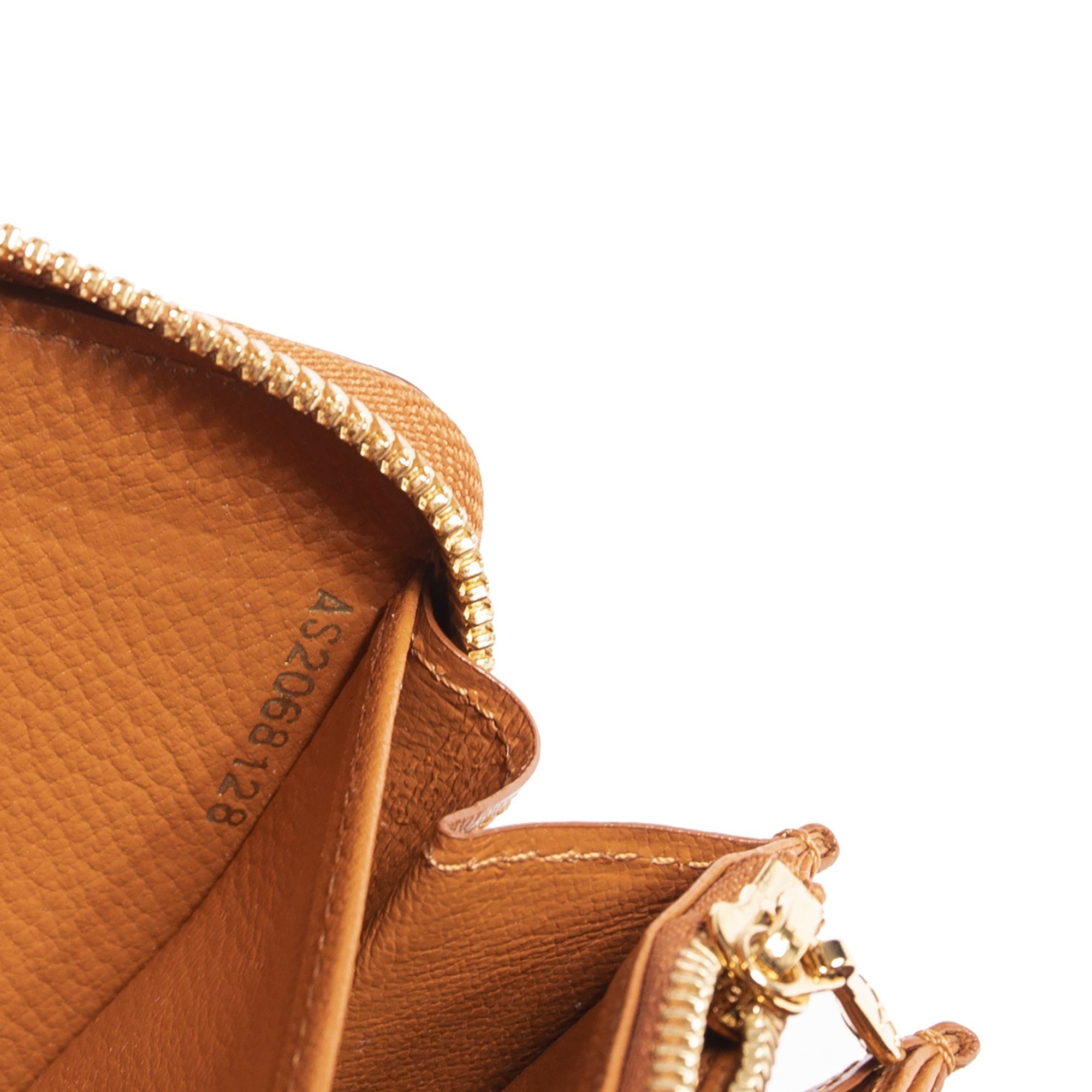 Louis Vuitton Ostrich Zippy Wallet