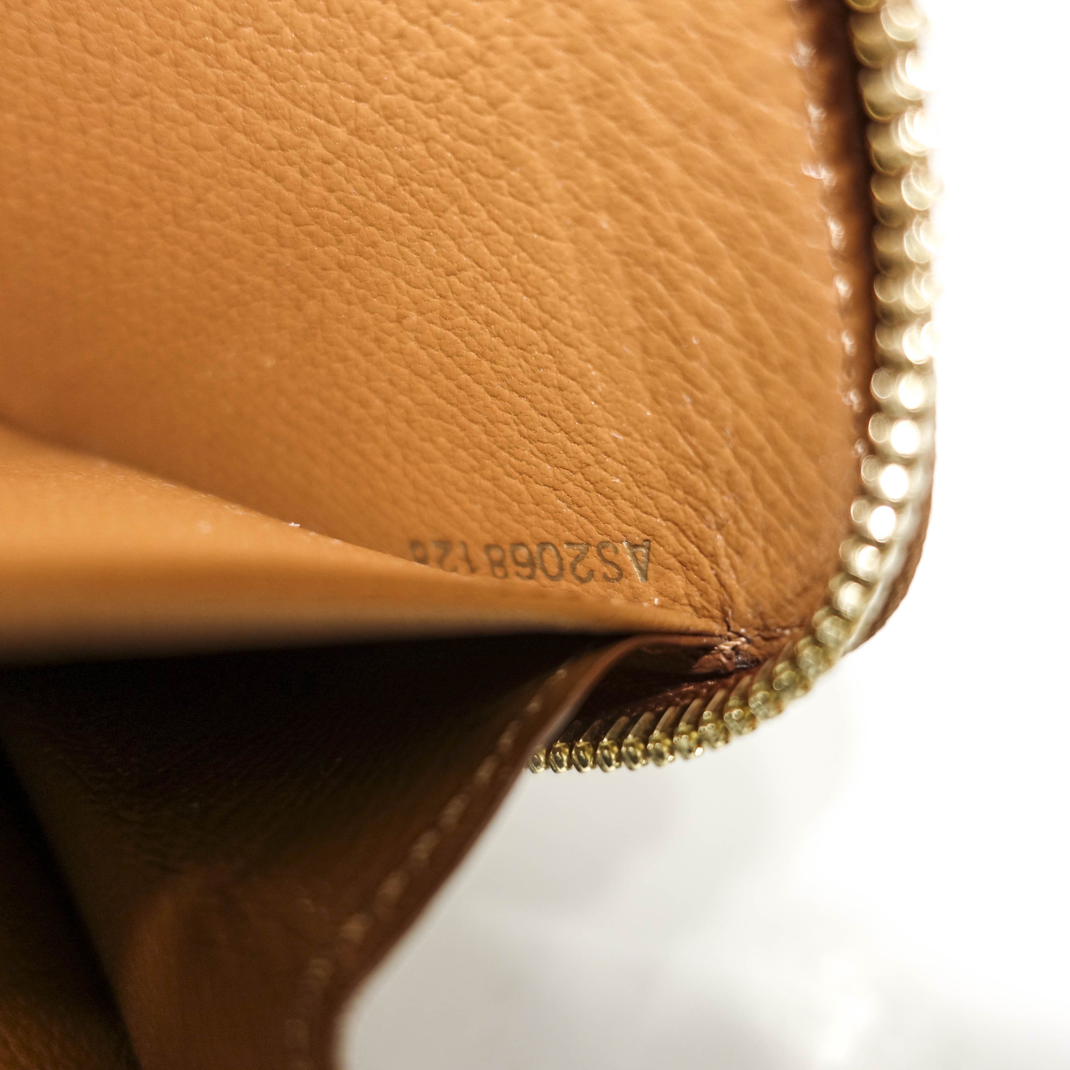 Louis Vuitton Ostrich Zippy Wallet