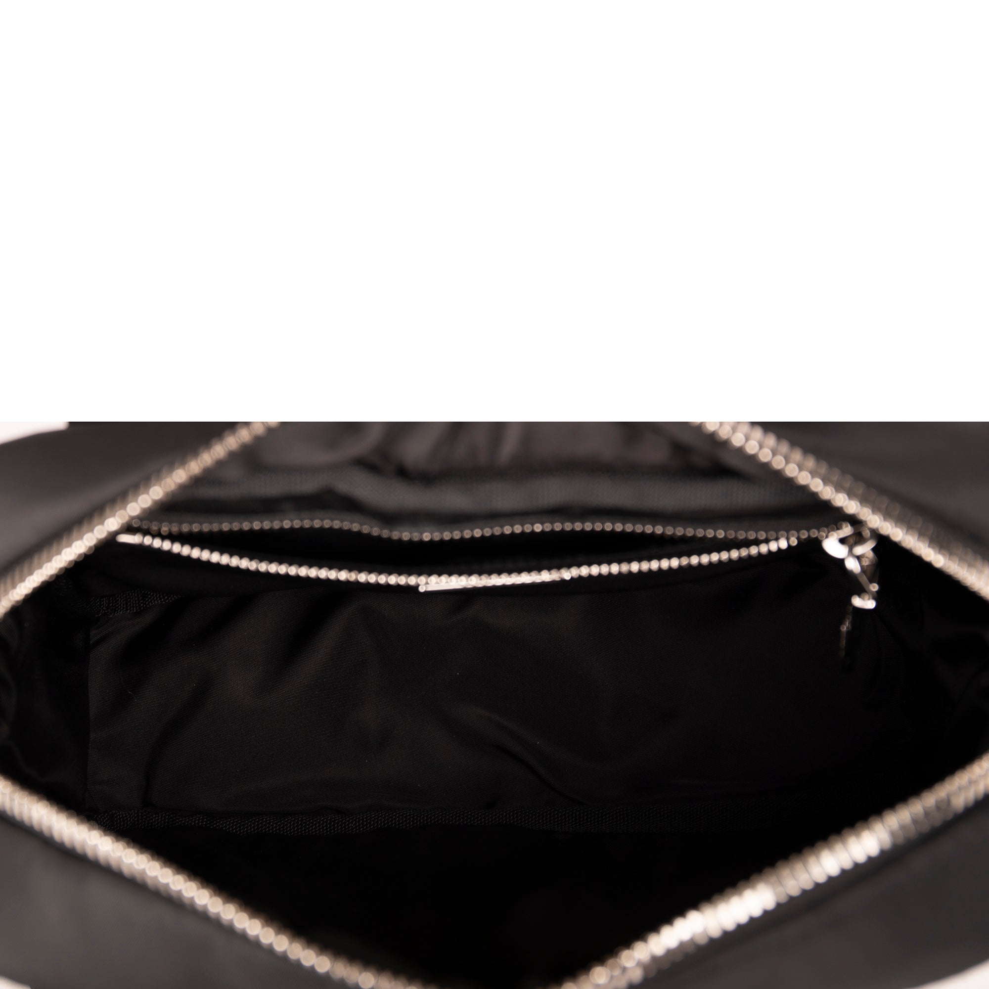 Prada Small Logo Patch Tessuto Nylon Backpack