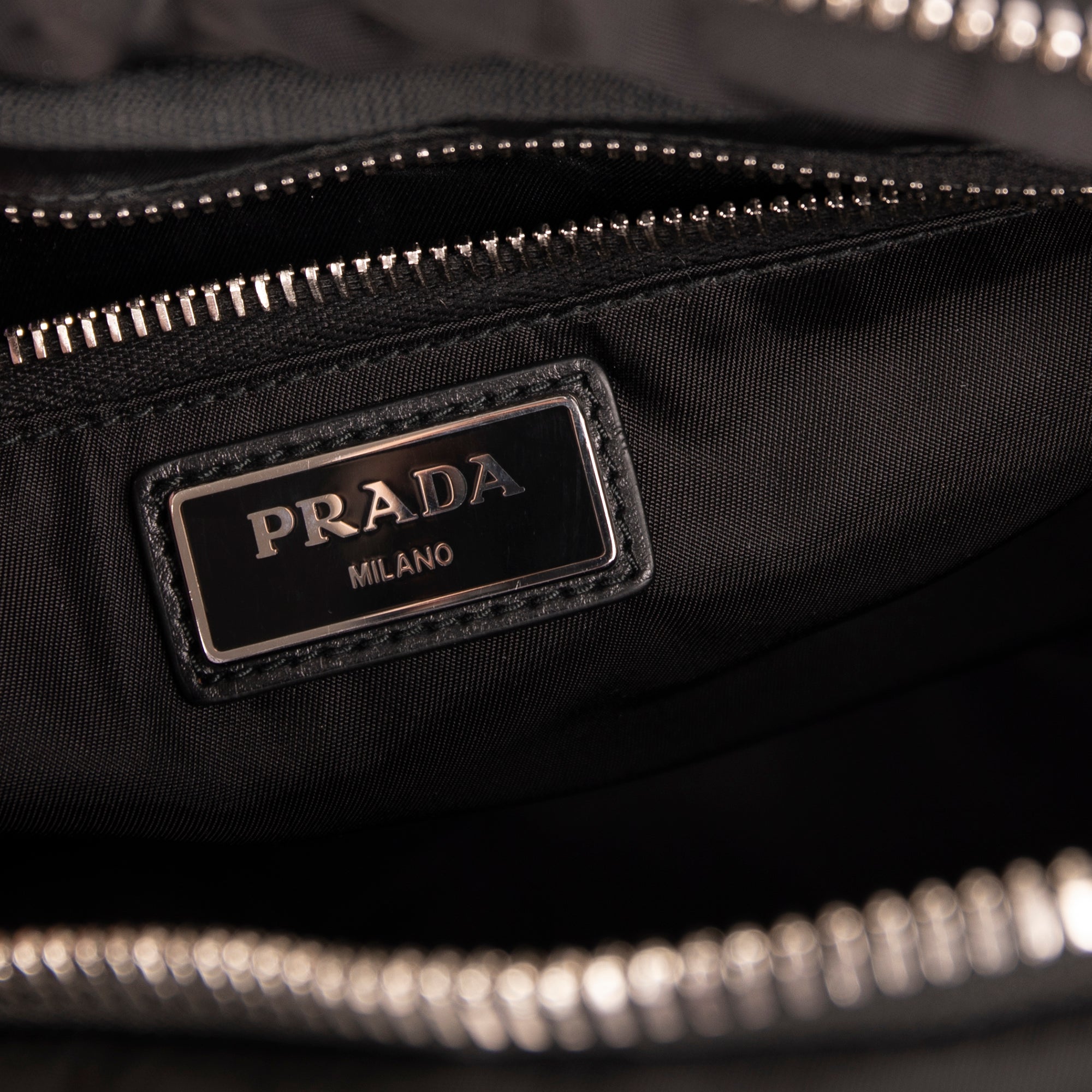 Prada Small Logo Patch Tessuto Nylon Backpack