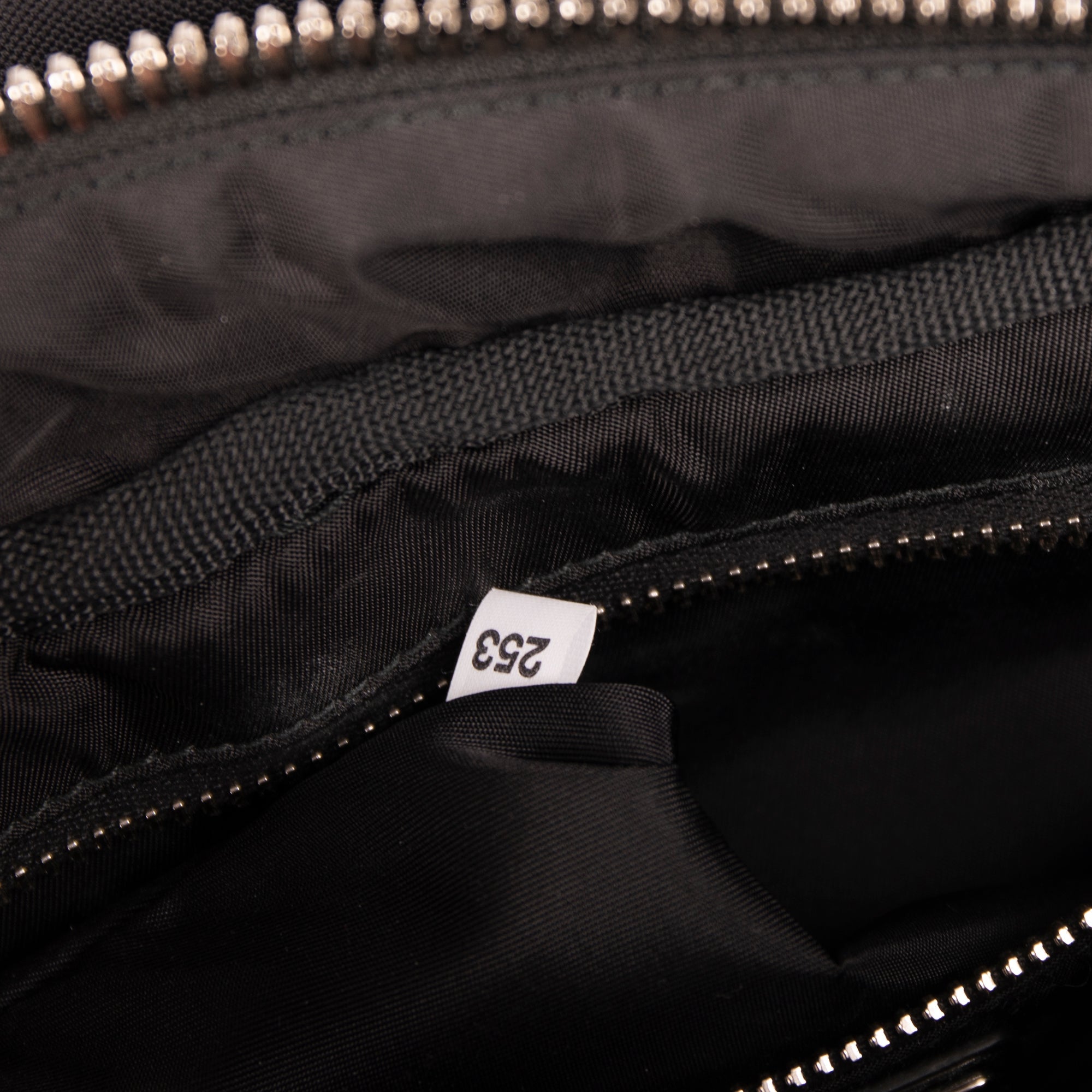 Prada Small Logo Patch Tessuto Nylon Backpack