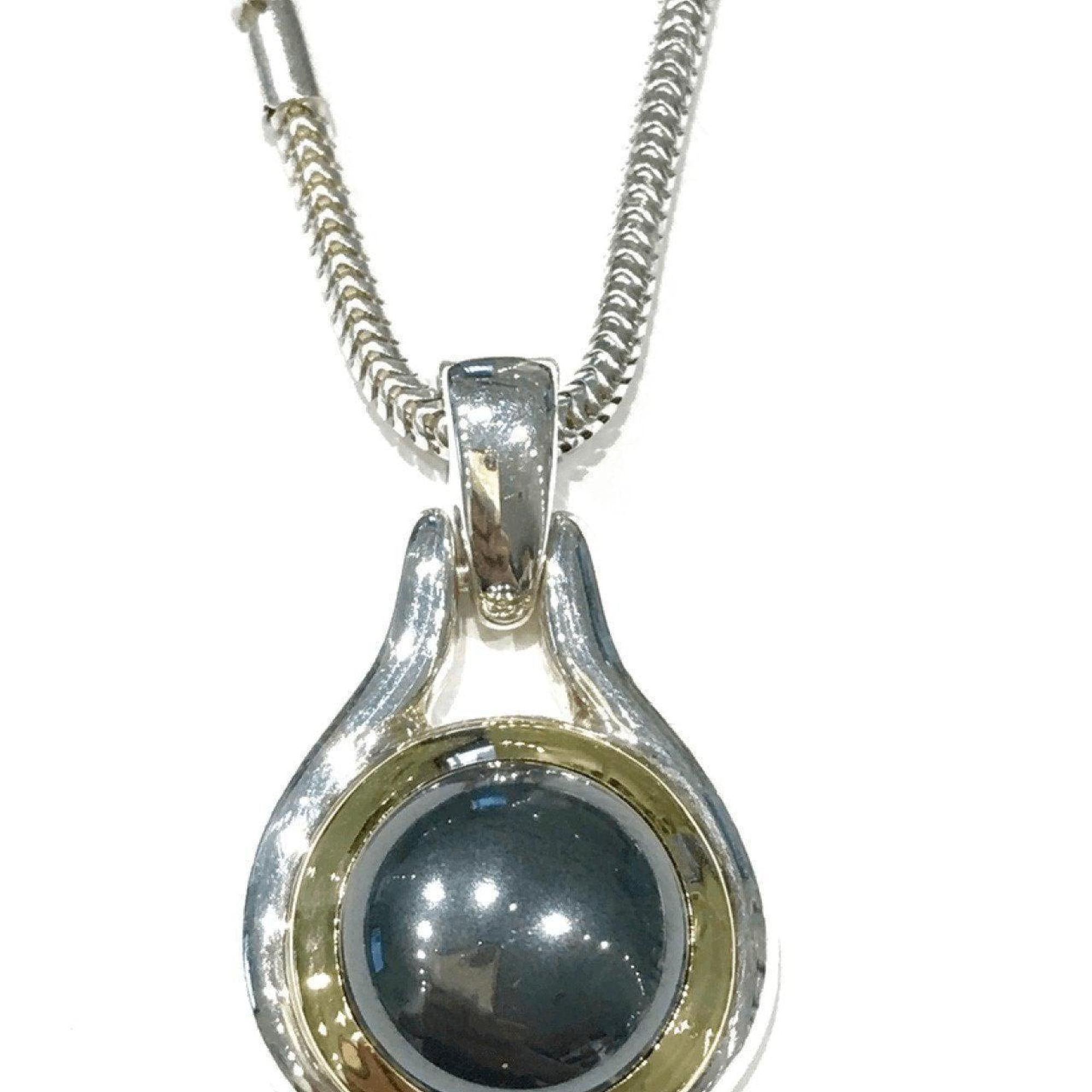 Tiffany & Co Sterling Silver and 18K Yellow Gold Hematite Pendant on a Silver Snake Link Neck Chain