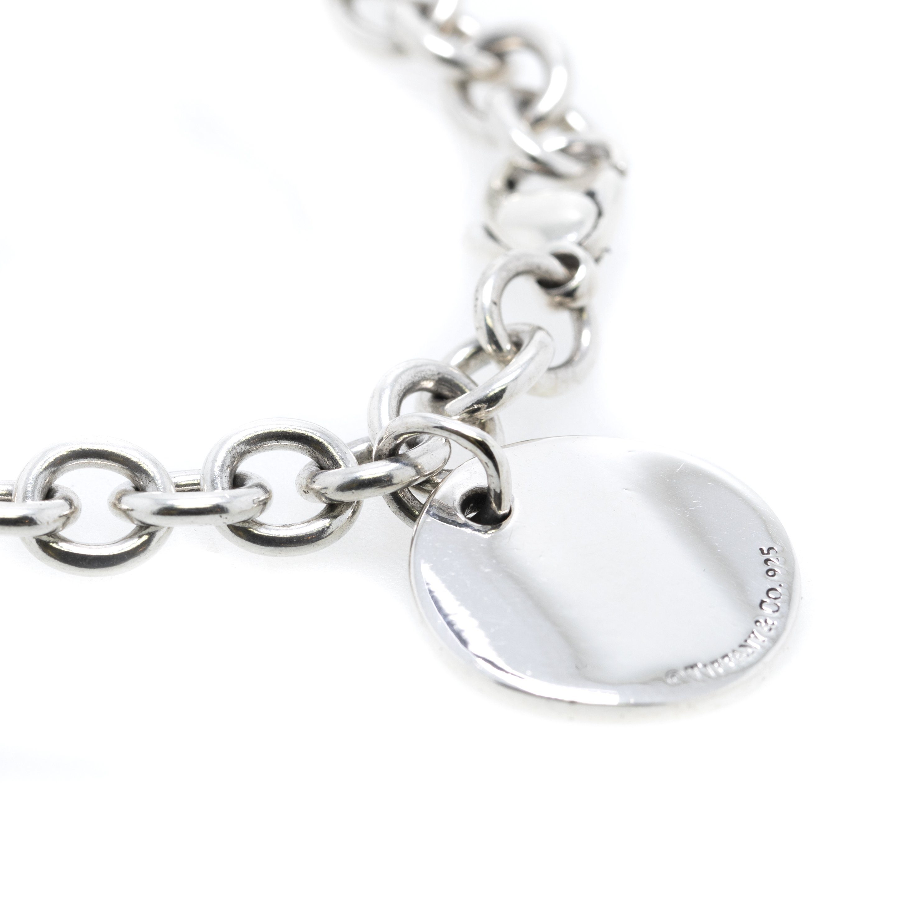 Tiffany & Co. Notes Round Tag Charm Bracelet