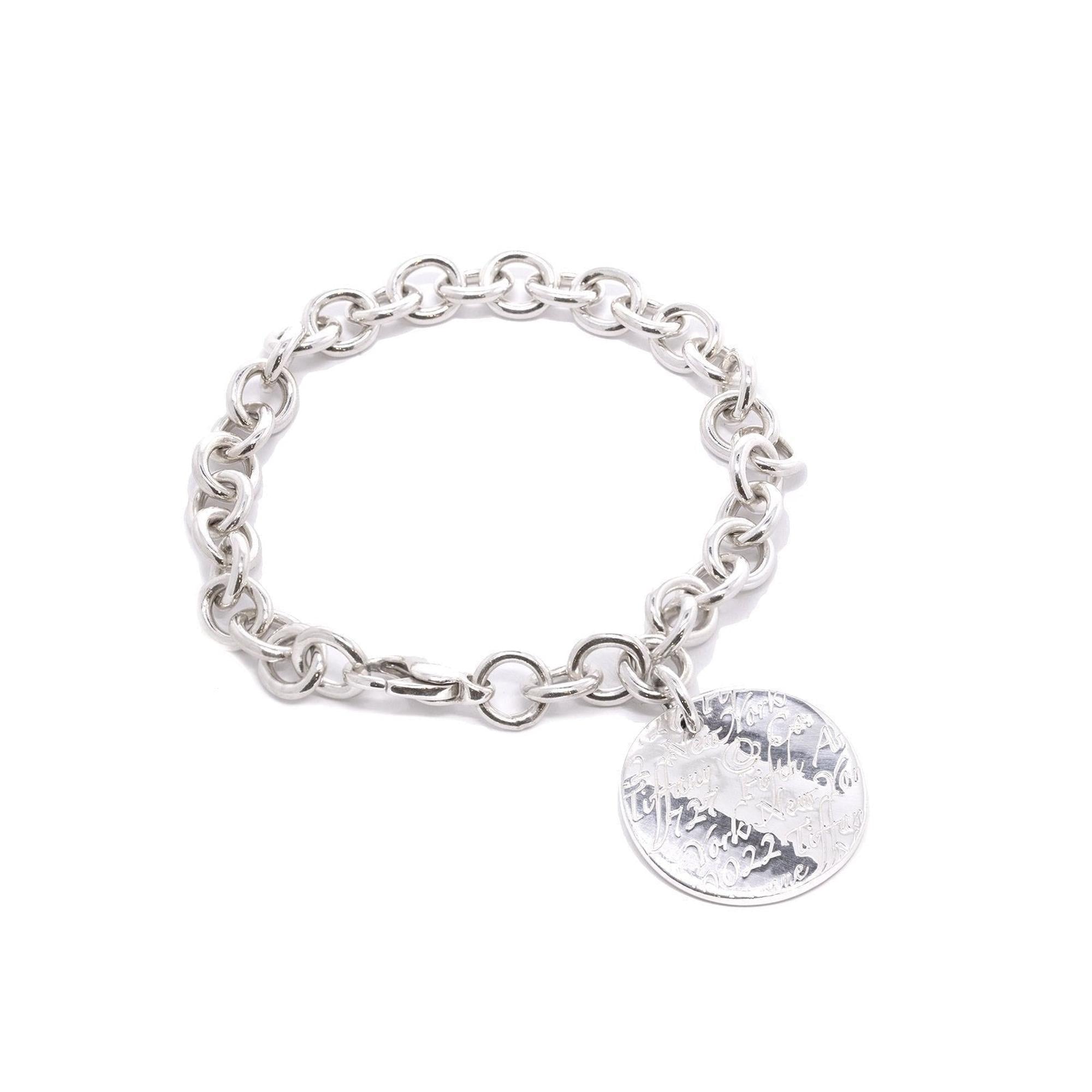 Tiffany & Co. Notes Round Tag Charm Bracelet