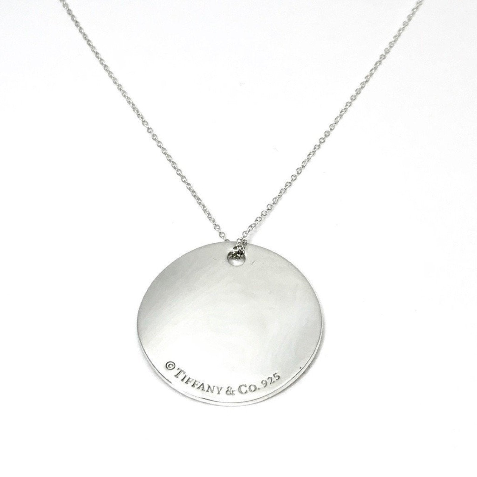 Tiffany & Co. Notes Round Tag Pendant Necklace in Sterling Silver